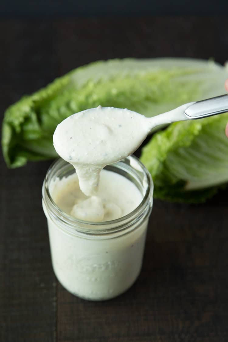 Creamy caesar salad dressing made with greek yogurt and parmesan cheese