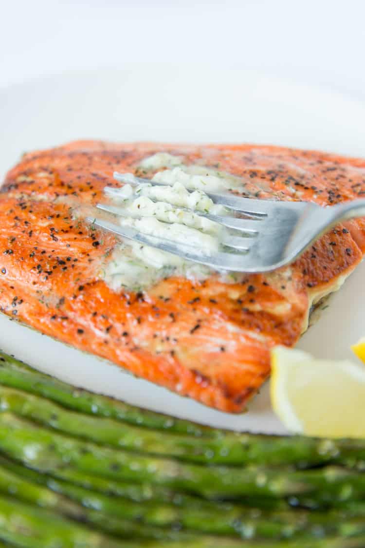 Pan seared salmon topped with a dill & garlic compound butter. 15 minute recipe!