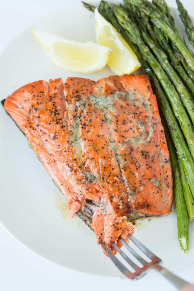 Pan seared salmon topped with a dill & garlic compound butter. 15 minute recipe!