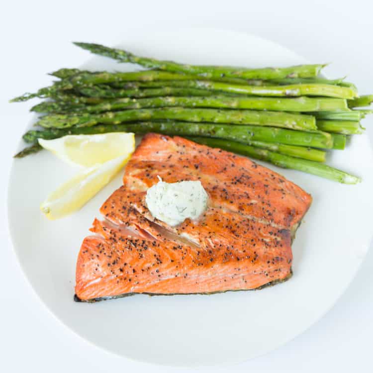 Pan seared salmon topped with a dill & garlic compound butter. 15 minute recipe!