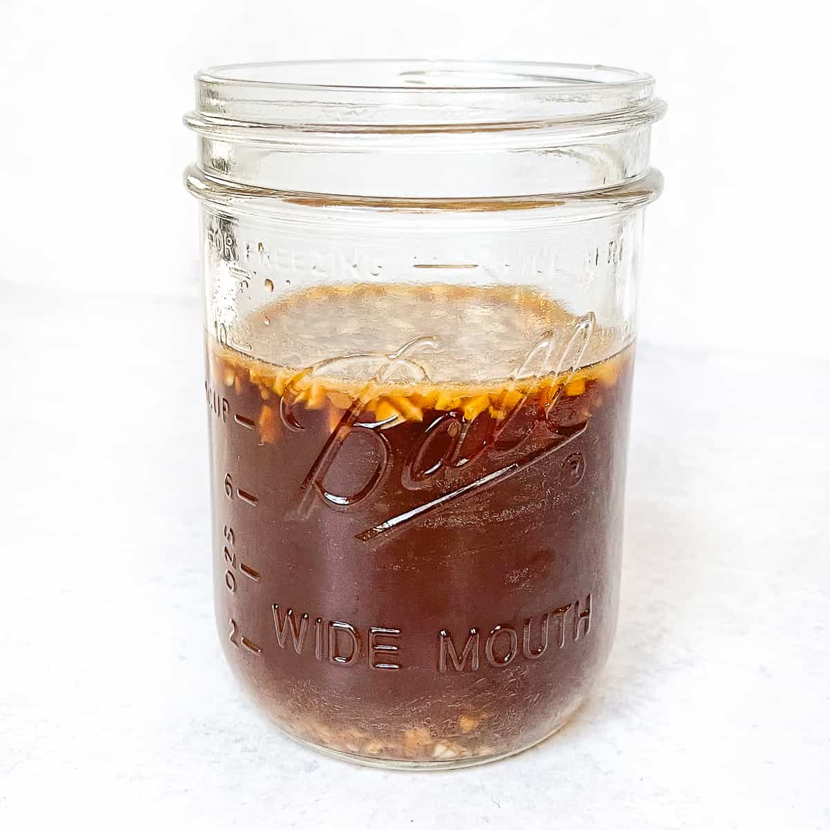 stir fry sauce made and stored in a wide mouth mason jar