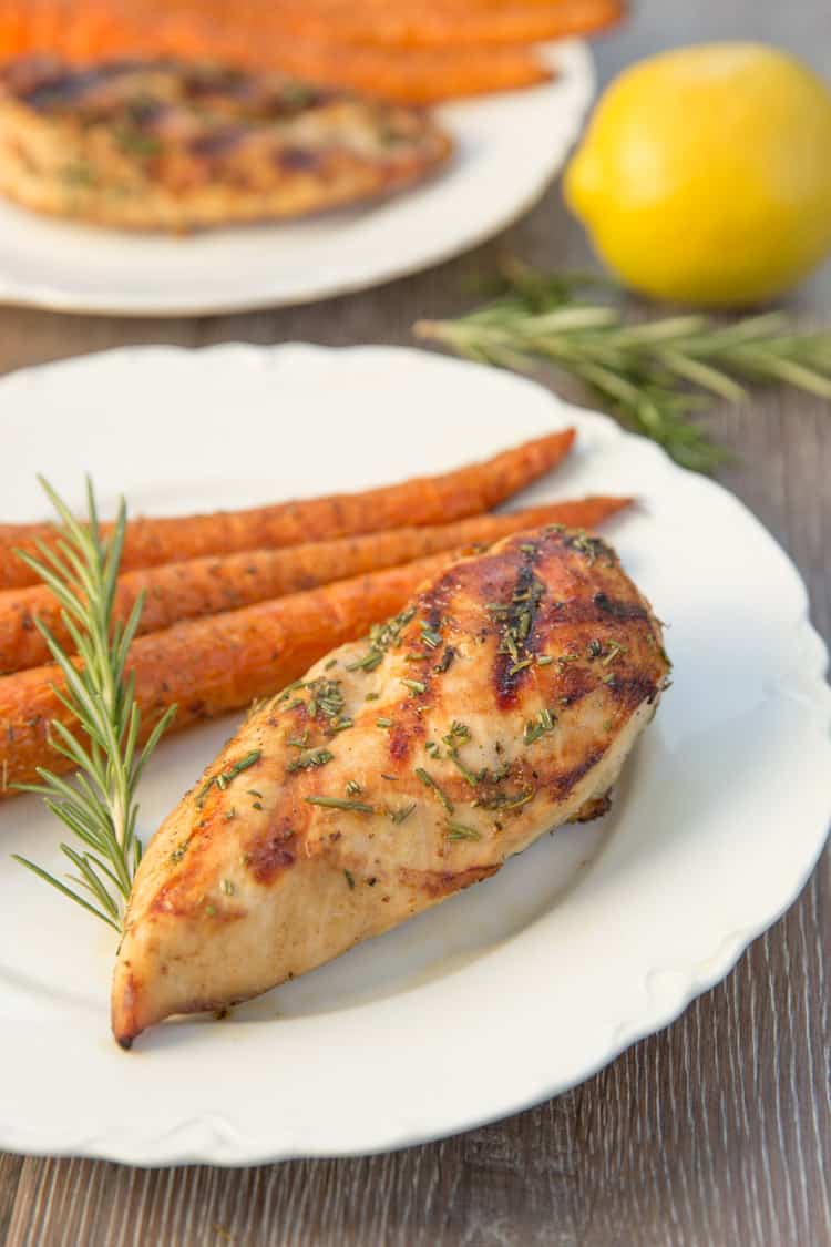 White wine marinated grilled chicken with lemon and rosemary. Perfect light summer dinner!