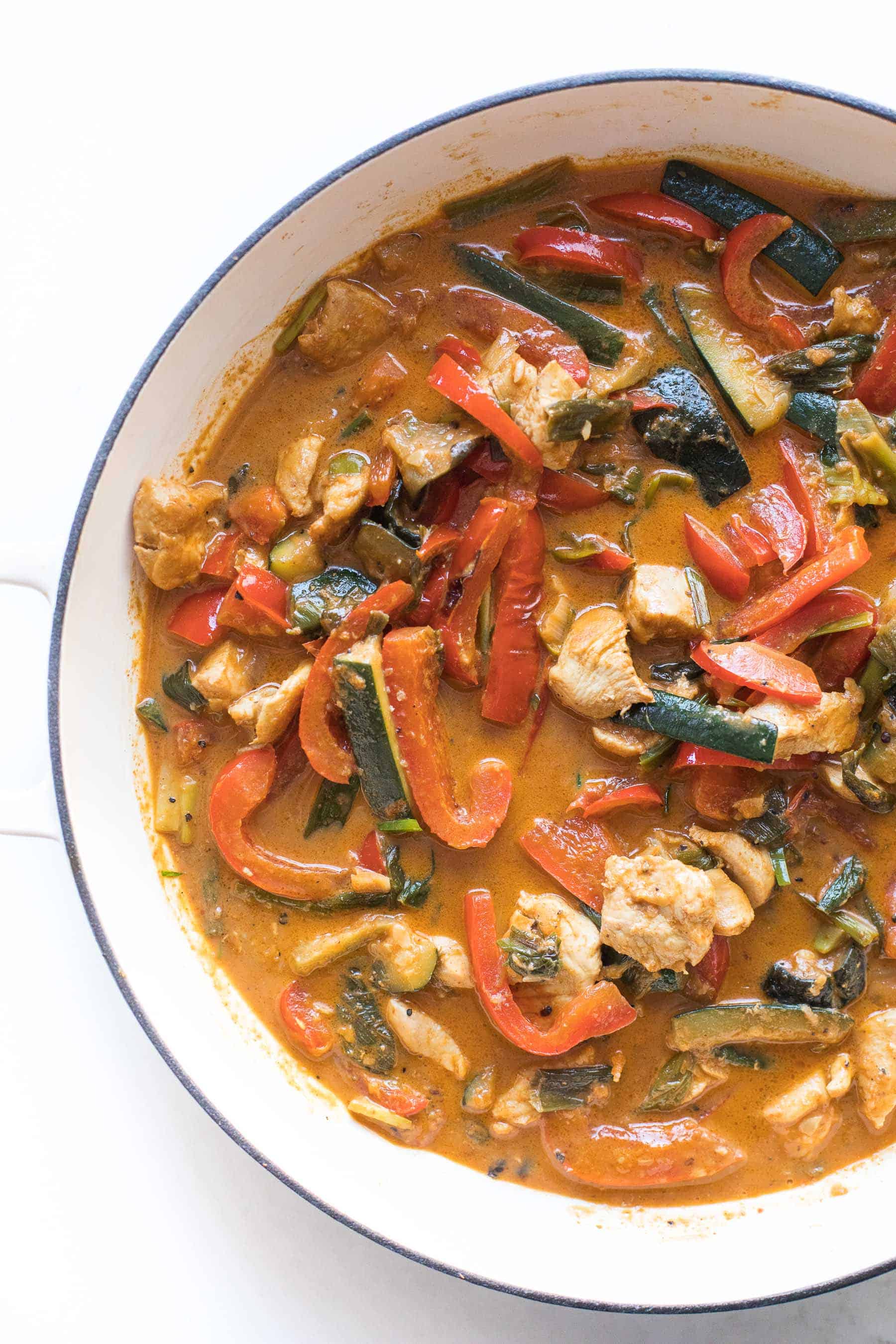 coconut chicken thai curry in a white skillet