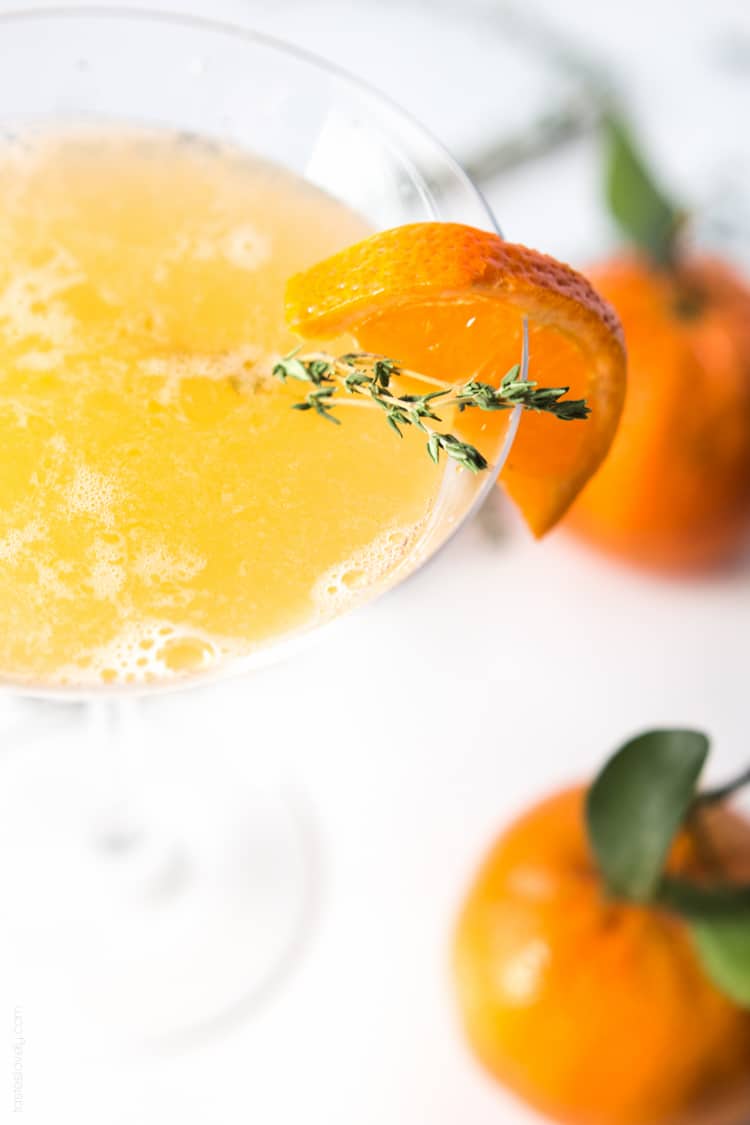 Tangerine & Thyme Martini - refreshing vodka martini, fresh tangerine juice, sweetened with a honey thyme simple syrup