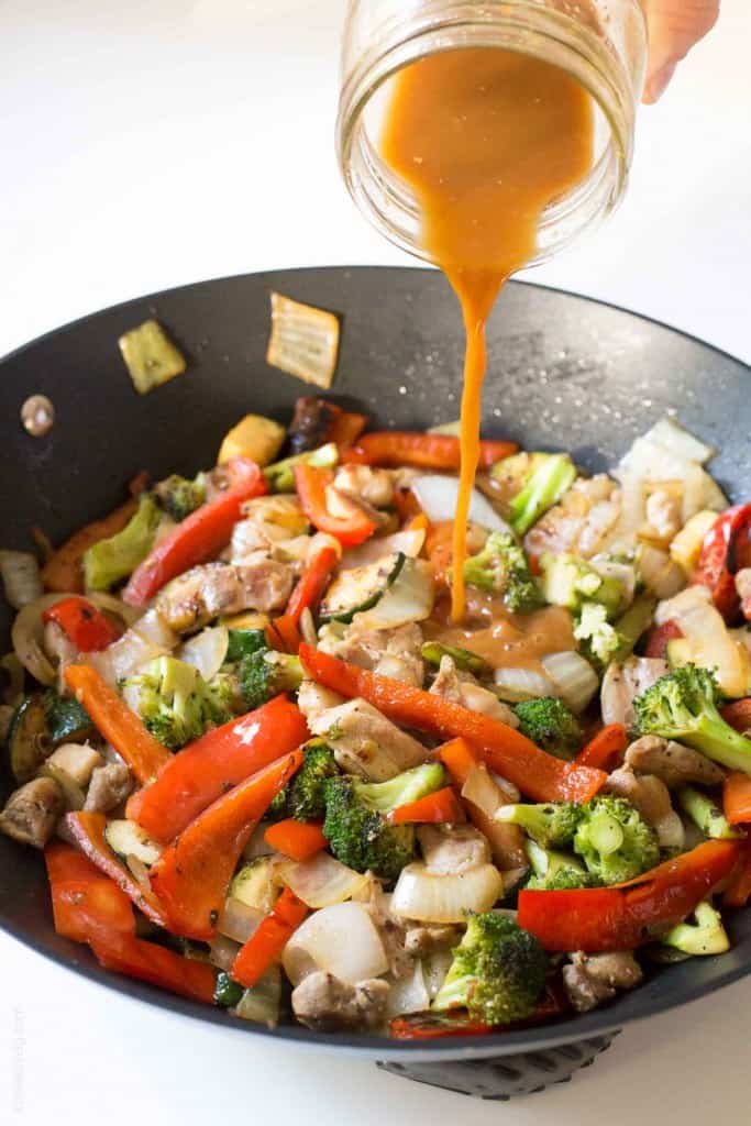 Broccoli and bell pepper chicken stir fry, made with the BEST stir fry sauce!