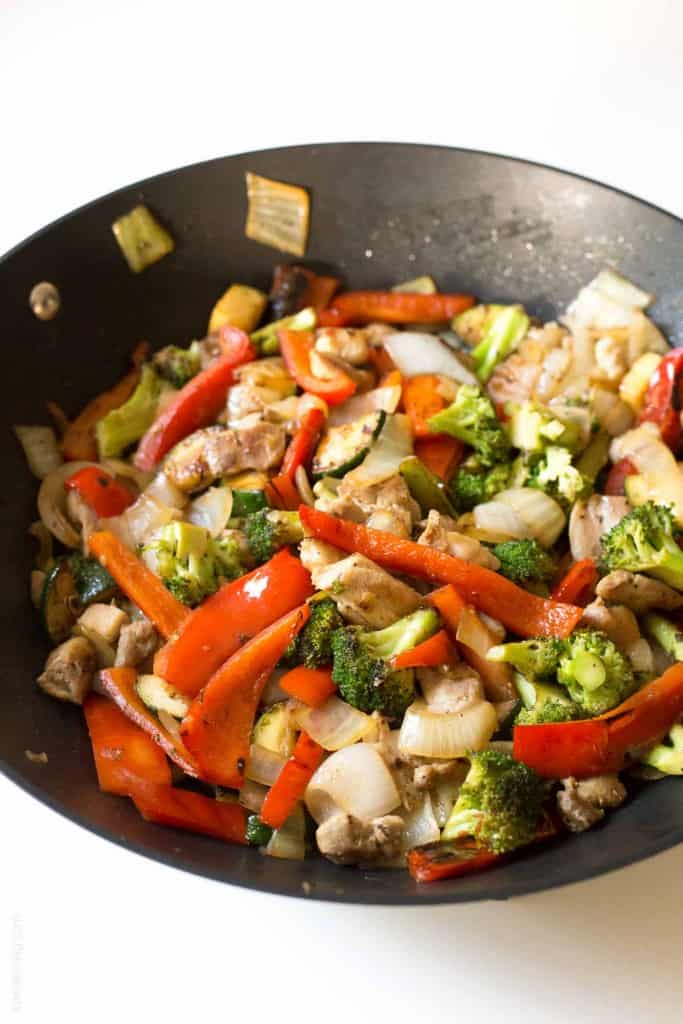 Broccoli and bell pepper chicken stir fry, made with the BEST stir fry sauce!