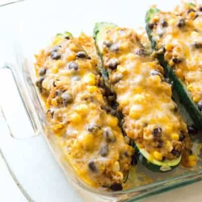 Quinoa & Black Bean Enchilada Stuffed Zucchinis (gluten free) | tasteslovely.com