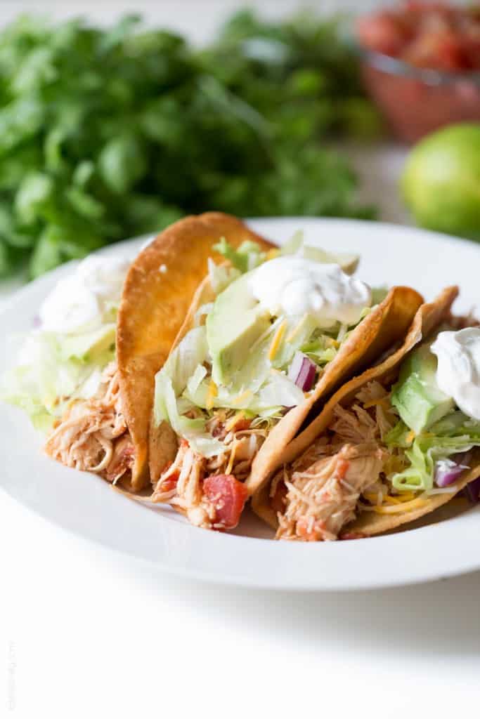 Slow Cooker Mexican Shredded Chicken Tacos - juiciest and most delicious chicken tacos ever! (gluten free)