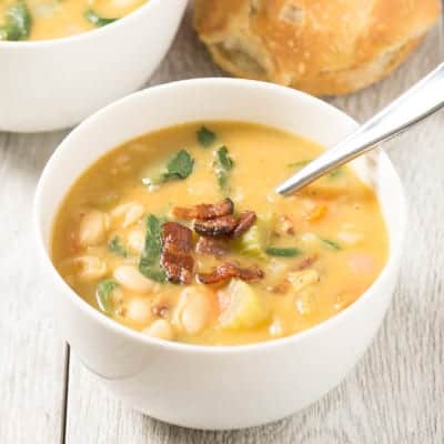 Bacon and White Bean Stew with Swiss Chard - BEST soup ever! | tasteslovely.com