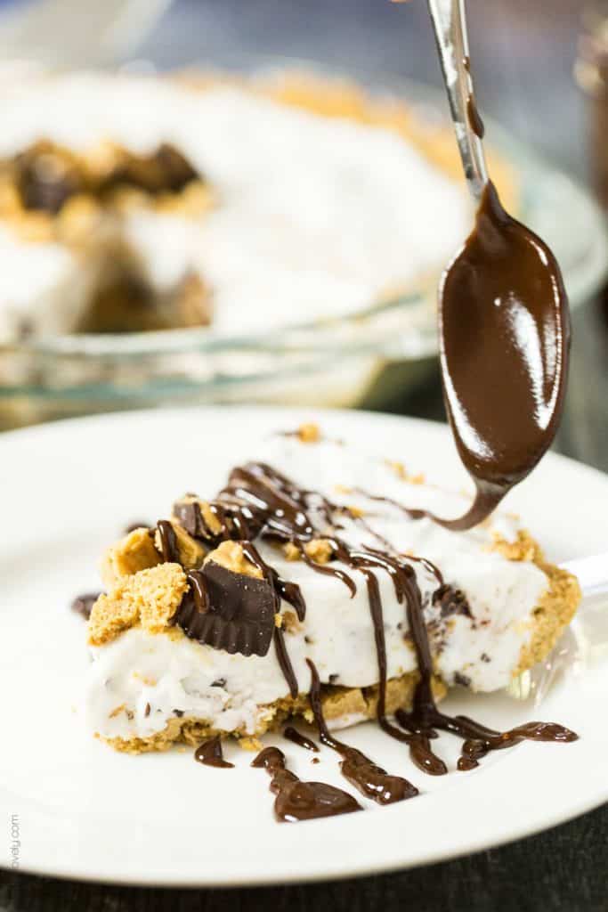 Peanut Butter Lovers Ice Cream Pie - a no bake dessert with a NUTTER BUTTER crust, vanilla and peanut butter cup ice cream filling, and a peanut butter chocolate sauce drizzled on top