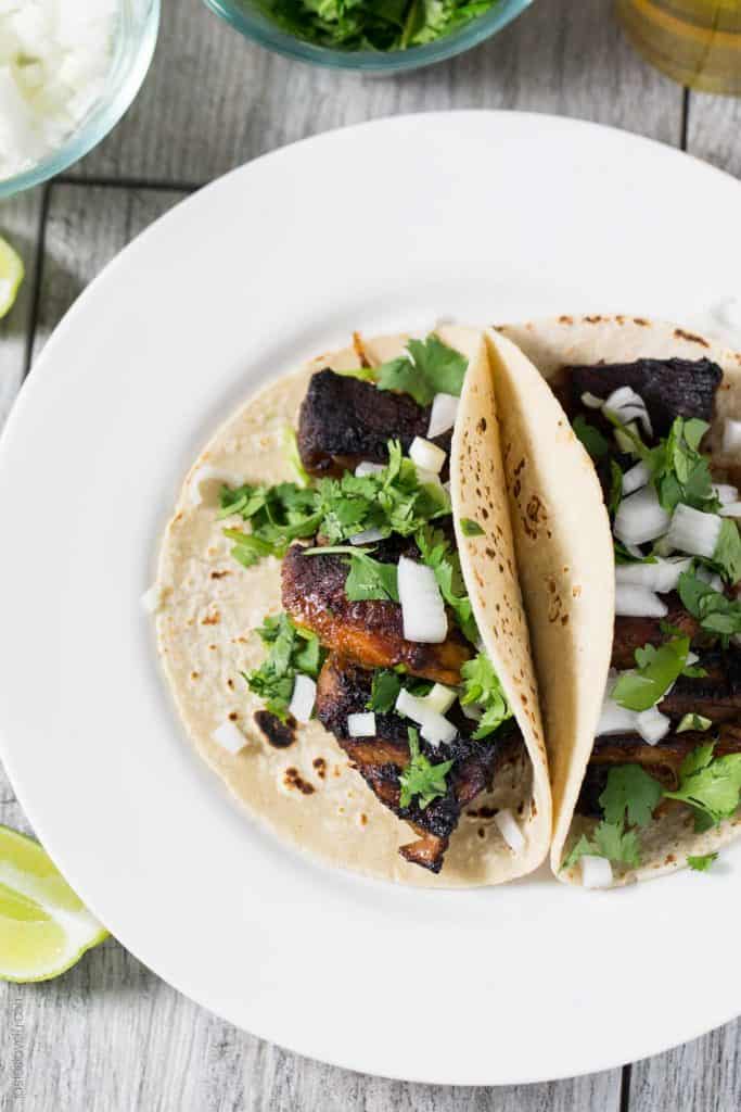 Street Style Crispy Carnitas Tacos - started in the slow cooker, then broiled in the oven to get them crispy