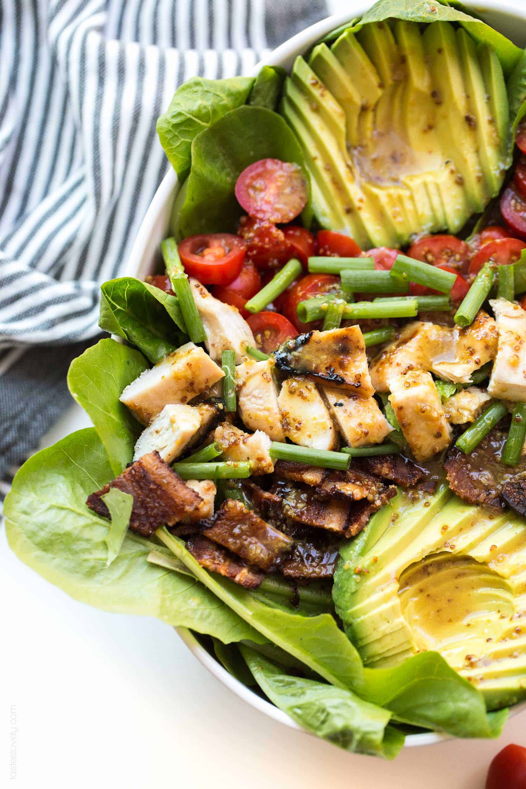 Paleo Honey Mustard Chicken, Bacon & Avocado Salad with tomatoes. A delicious and healthy summer dinner recipe that is paleo, gluten free, dairy free, refined sugar free.