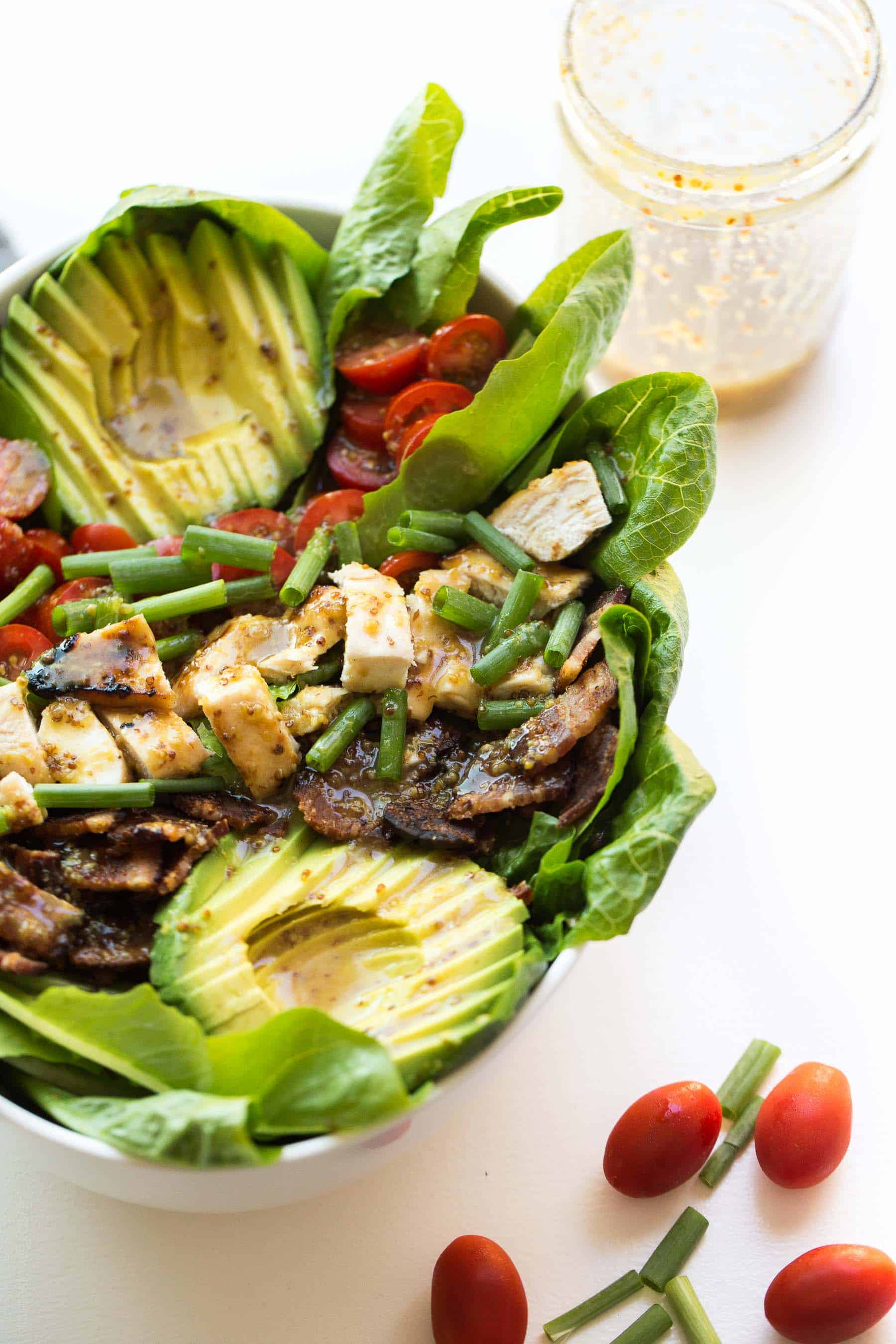 Paleo Honey Mustard Chicken, Bacon & Avocado Salad with tomatoes. A delicious and healthy summer dinner recipe that is paleo, gluten free, dairy free, refined sugar free.