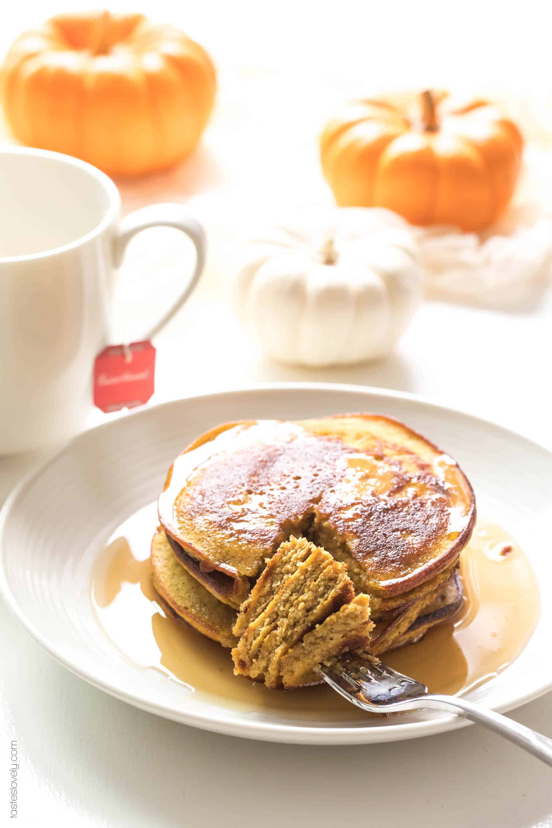 Paleo Pumpkin Pancakes made with almond flour and coconut flour. Light and fluffy pancakes packed with pumpkin flavor! Paleo, gluten free, grain free, dairy free, refined sugar free, clean eating.