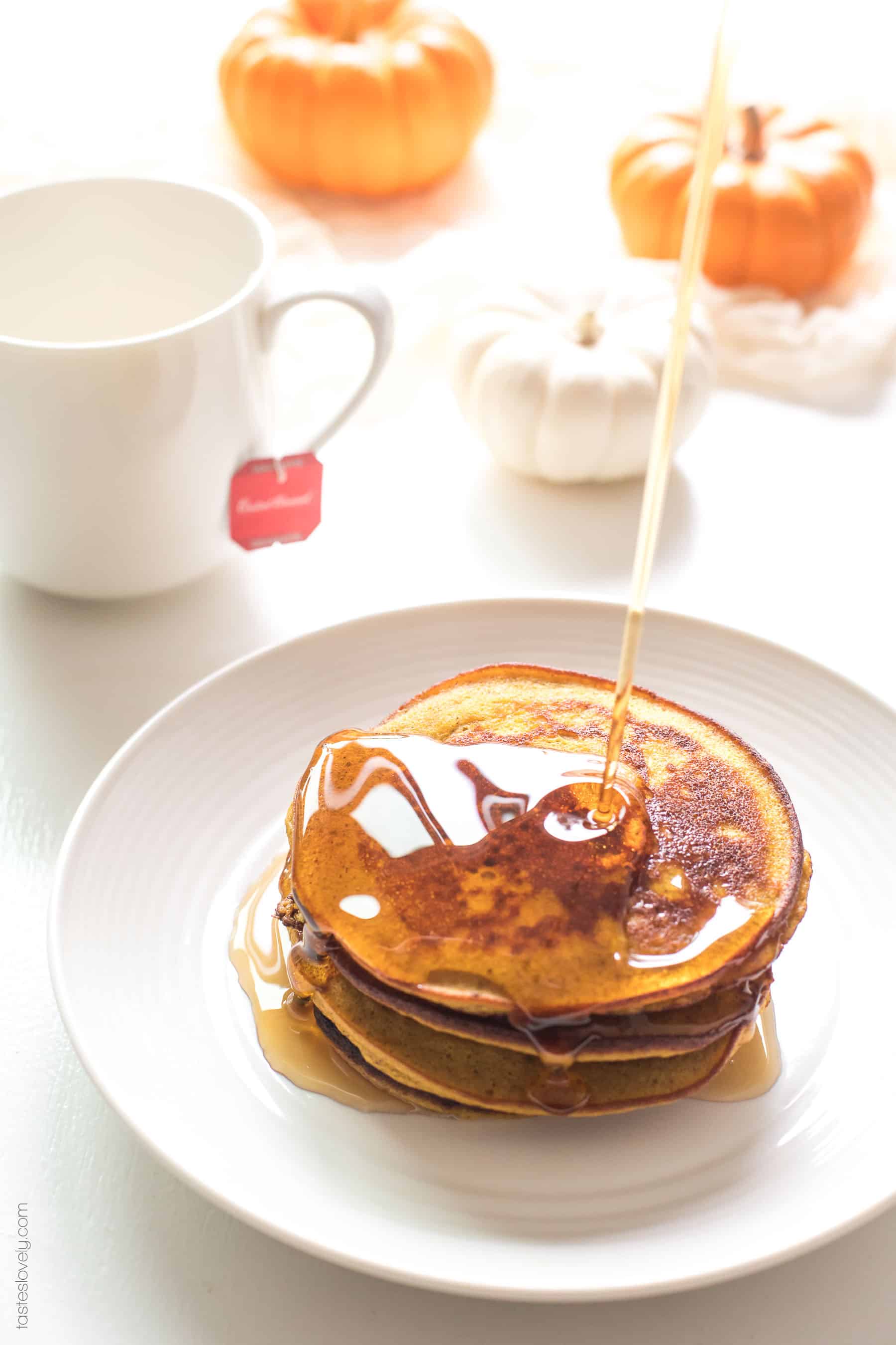 Paleo Pumpkin Pancakes made with almond flour and coconut flour. Light and fluffy pancakes packed with pumpkin flavor! Paleo, gluten free, grain free, dairy free, refined sugar free, clean eating.