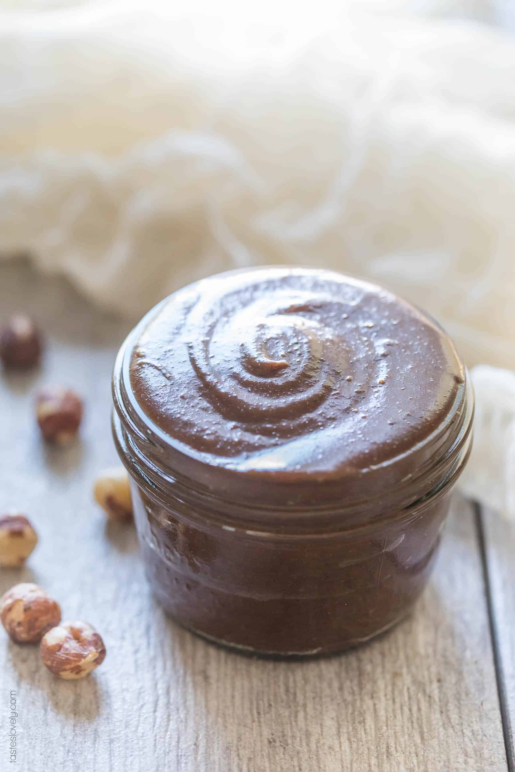 Homemade Paleo Nutella - made with just hazelnuts, cocoa powder and coconut sugar! A much healthier Nutella copycat hazelnut spread that is paleo, dairy free, refined sugar free, gluten free, grain free and clean eating.