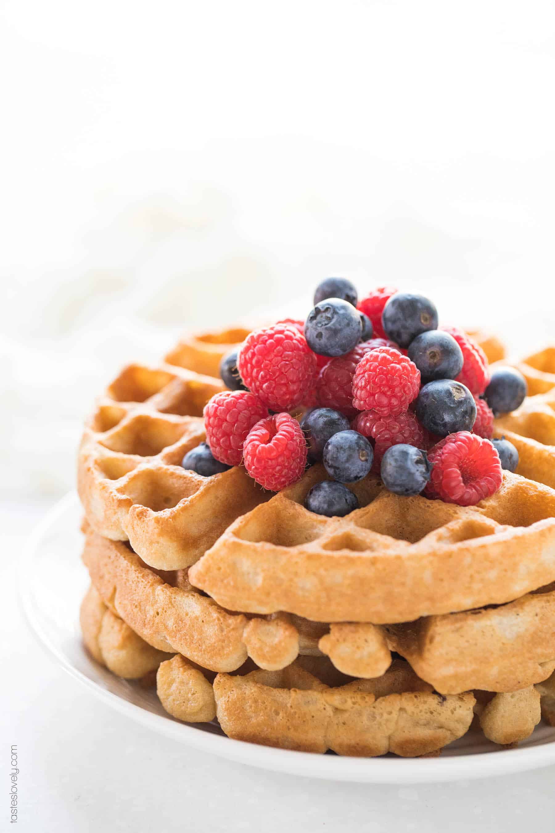 Crispy Paleo Waffles - the most delicious and crispy waffle recipe ever! You'd never guess these were paleo, gluten free, dairy free and refined sugar free!