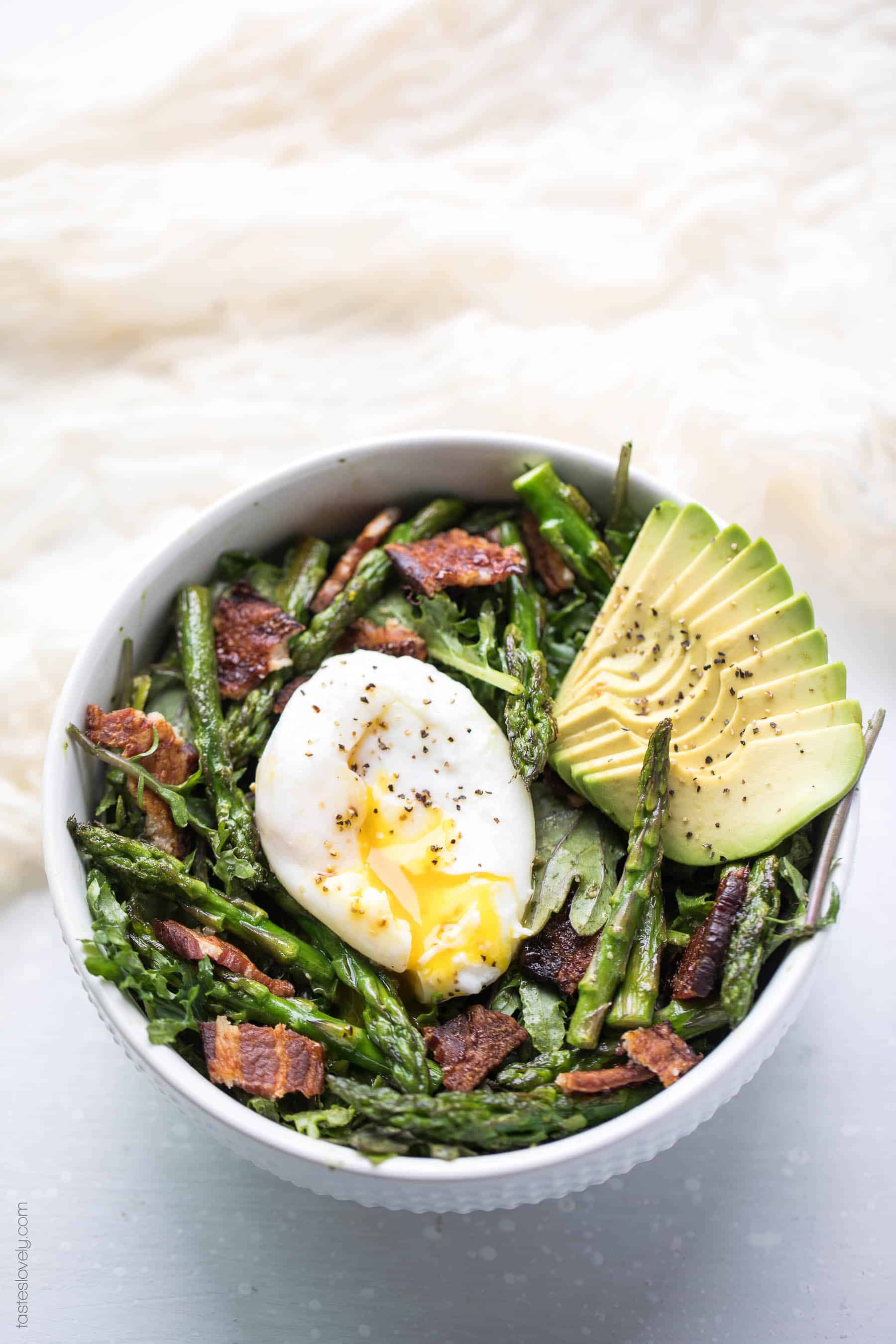 Paleo + Whole30 Brunch Kale Salad - baby kale tossed in an herby green dressing topped with bacon, asparagus and a poached egg (gluten free, grain free, dairy free, sugar free, clean eating)