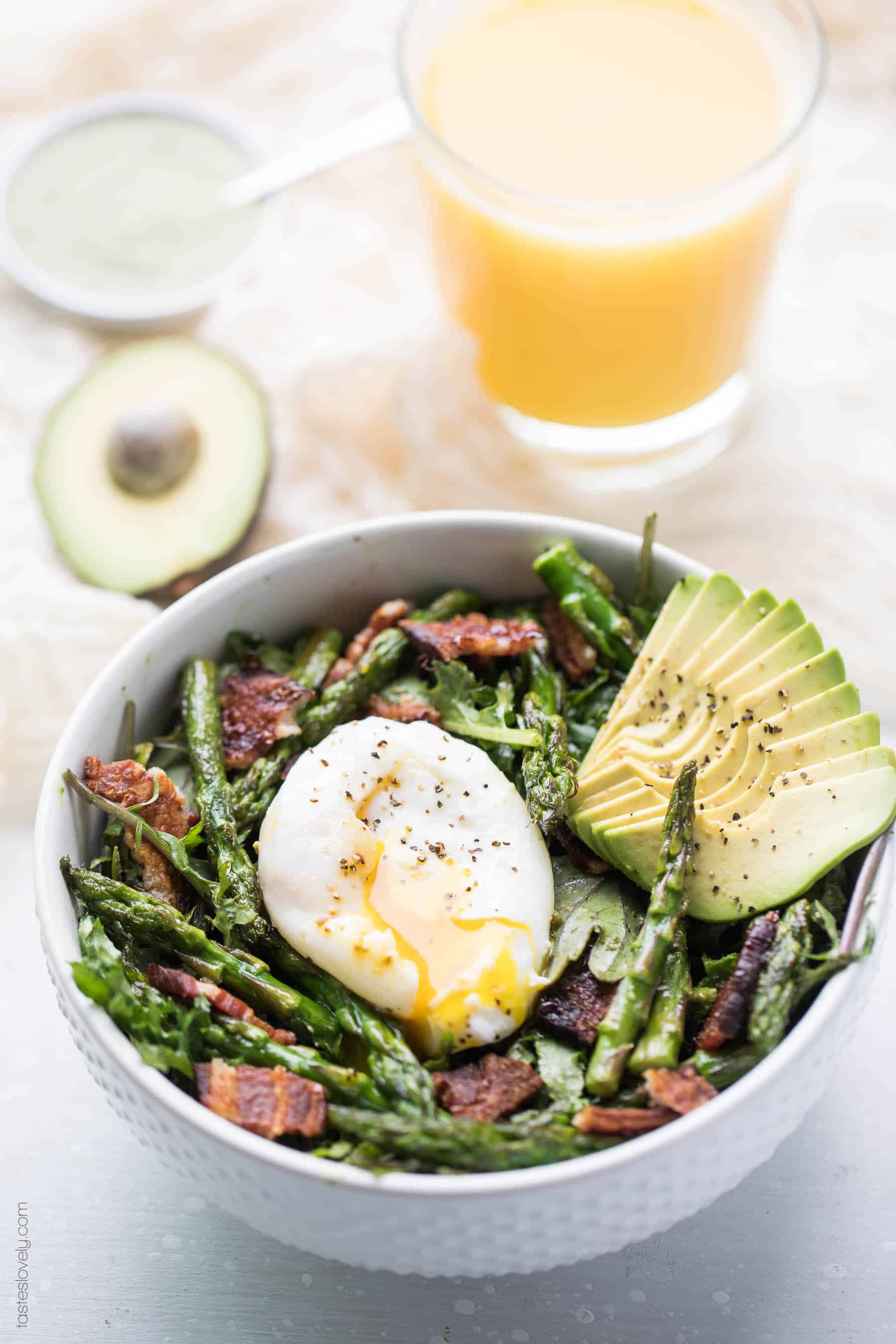 Paleo + Whole30 Brunch Kale Salad - baby kale tossed in an herby green dressing topped with bacon, asparagus and a poached egg (gluten free, grain free, dairy free, sugar free, clean eating)