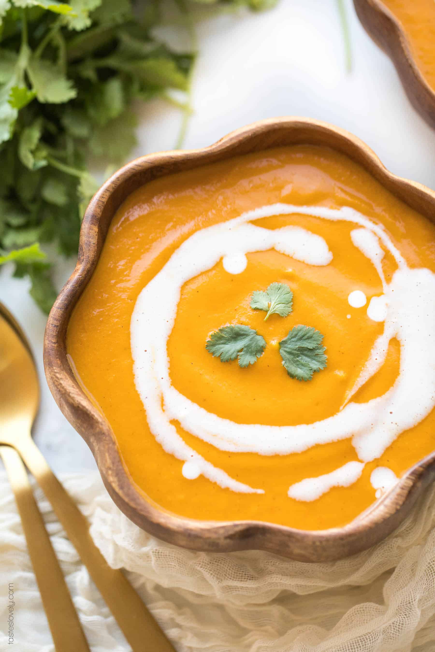 Bowl of butternut squash with cilantro garnish