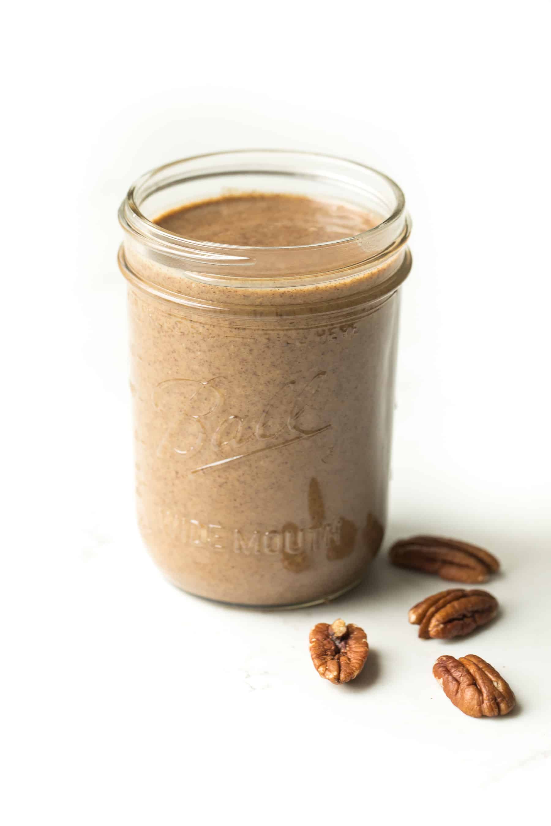 a mason jar of homemade pecan butter