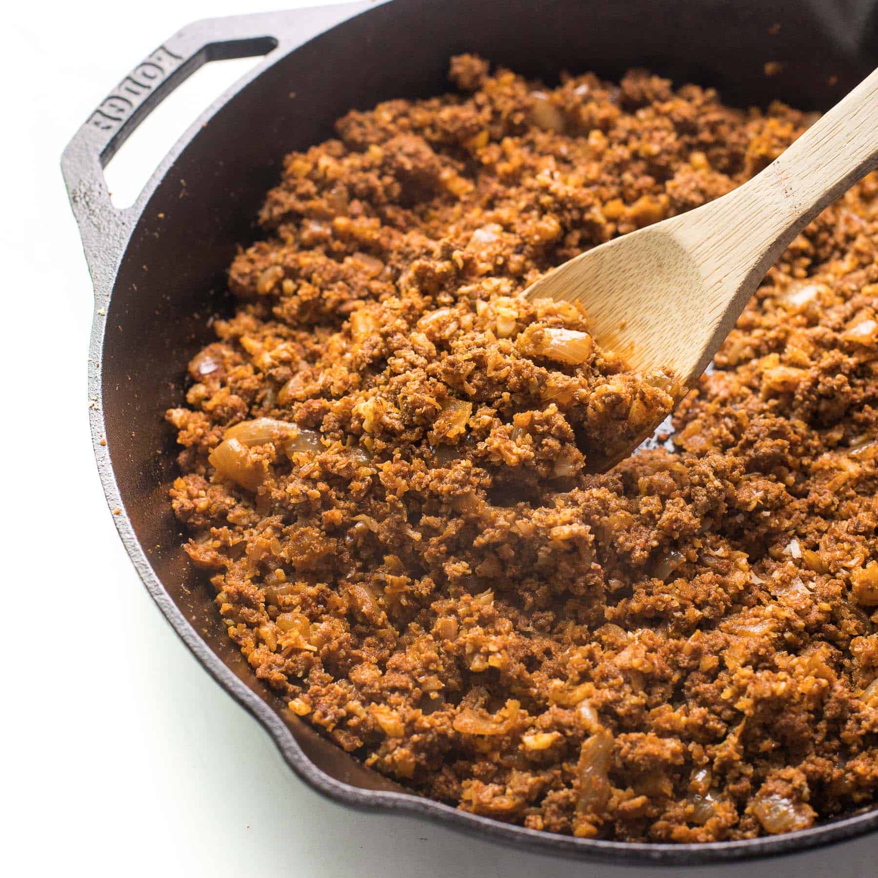 Use Your Potato Masher To Break Up Ground Meat in the Skillet