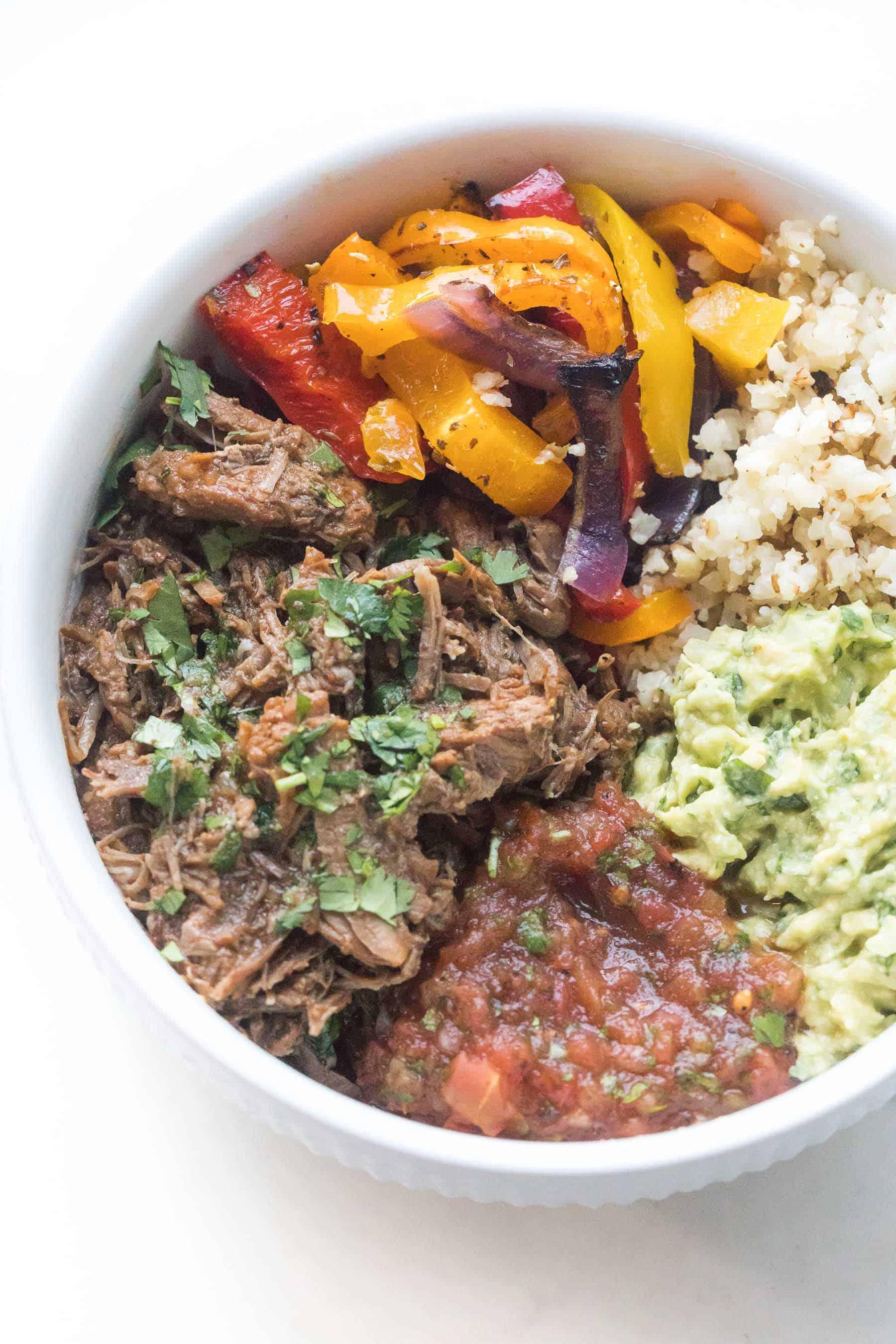 barbacoa burrito bowls on a white background