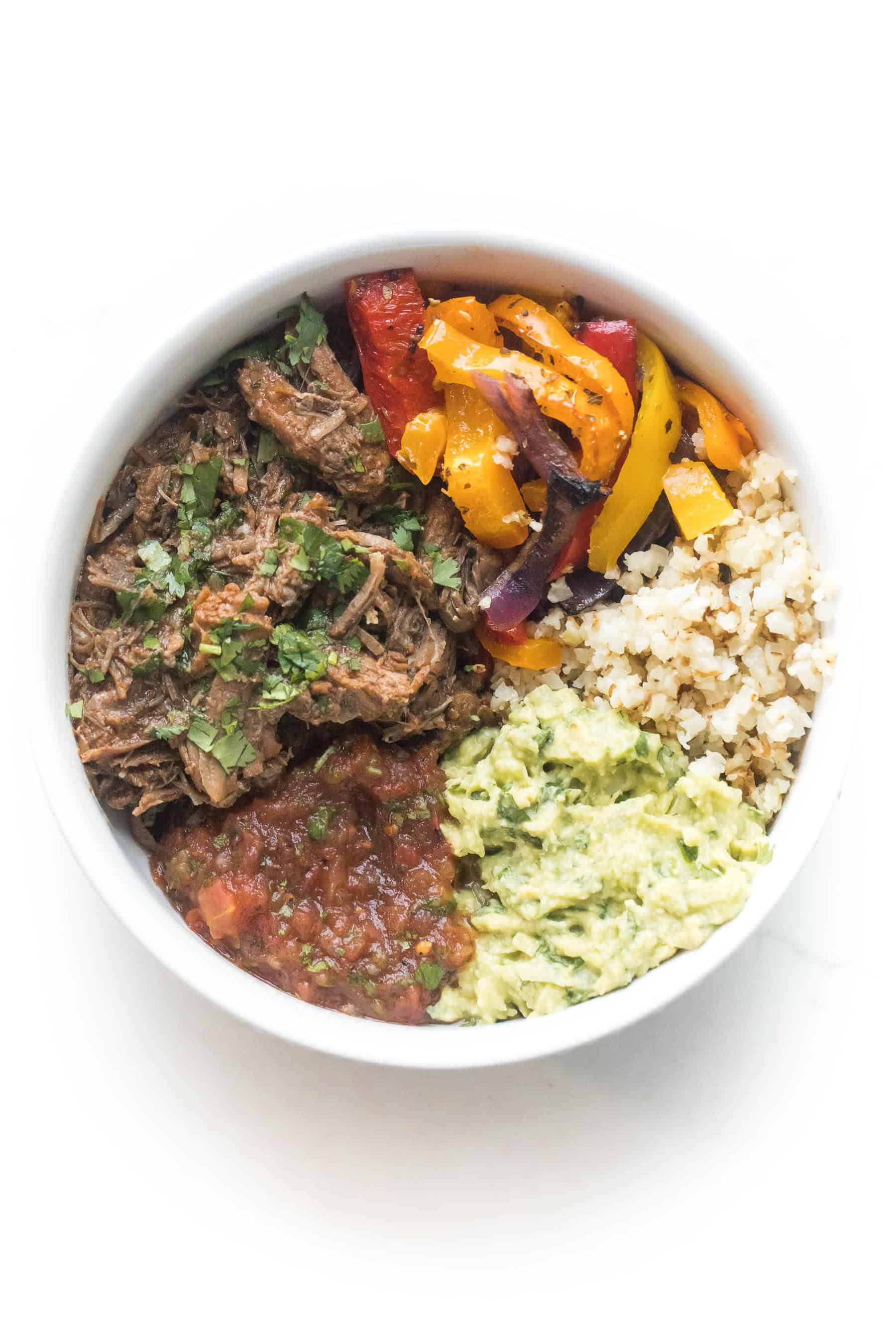 barbacoa burrito bowls on a white background