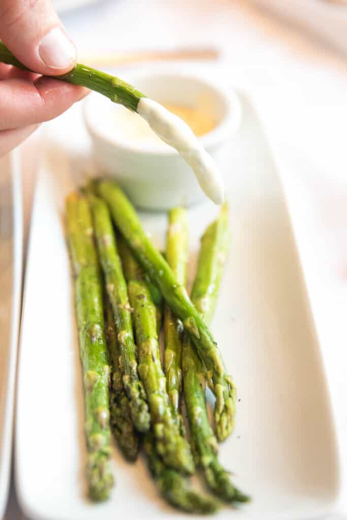 grilled asparagus with hollandaise sauce at ruth's chris steakhouse keto friendly menu