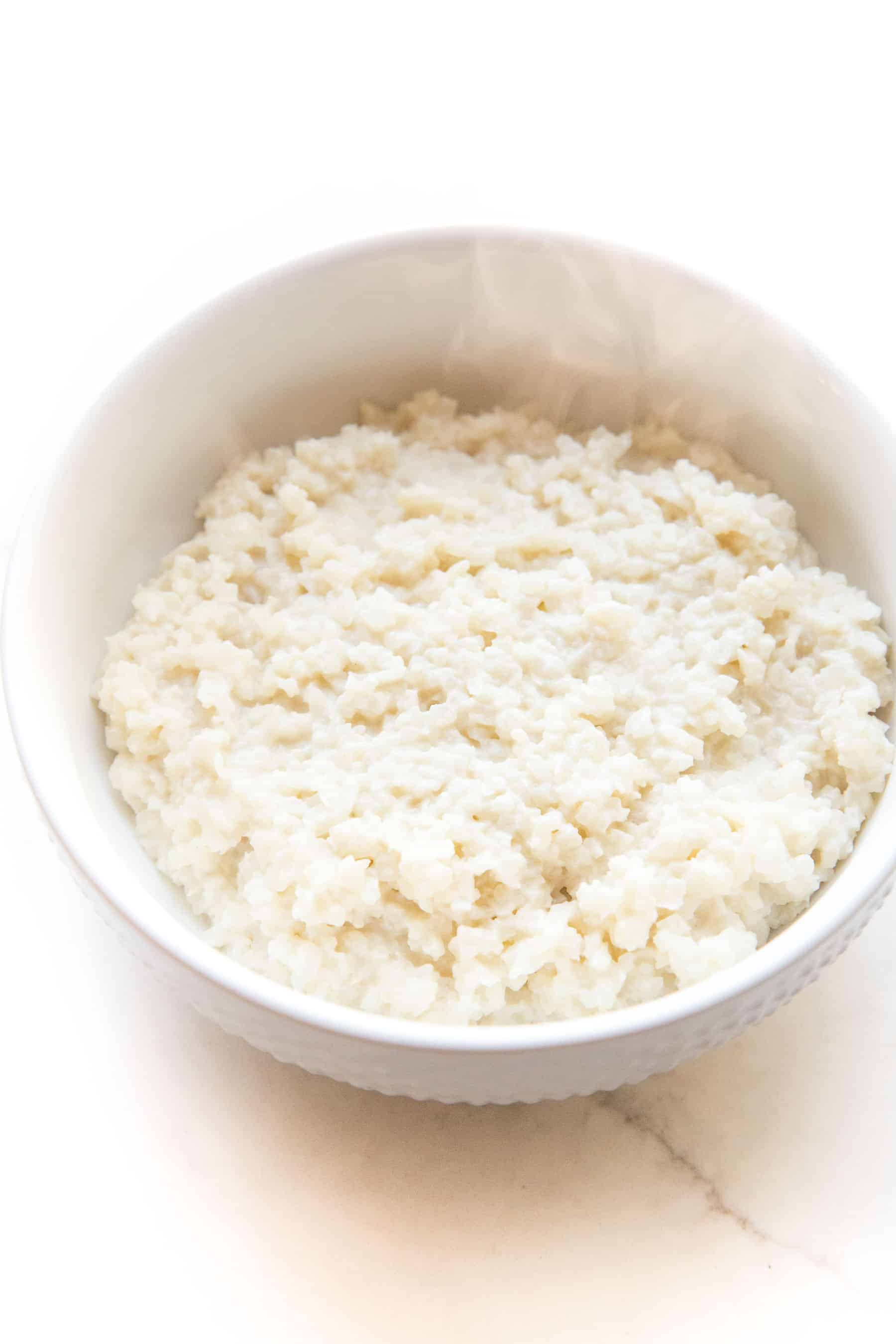 cauliflower rice risotto in a white bowl