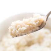 fork holding cauliflower rice risotto