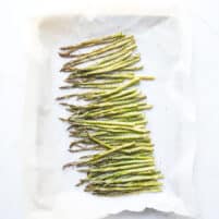 roasted asparagus on a rimmed baking sheet