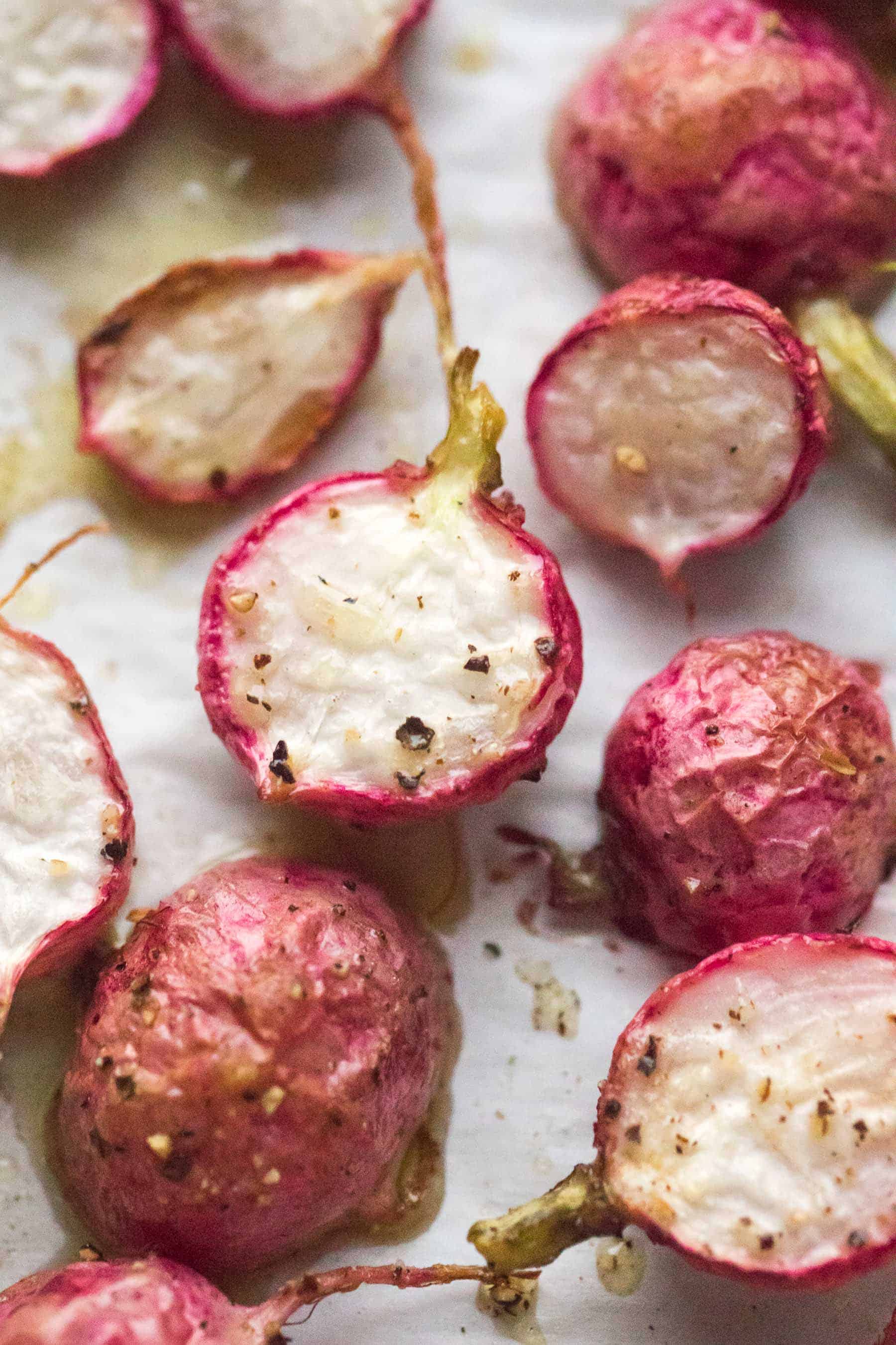 roasted radishes on a baking sheet