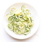 zucchini noodles on a white plate