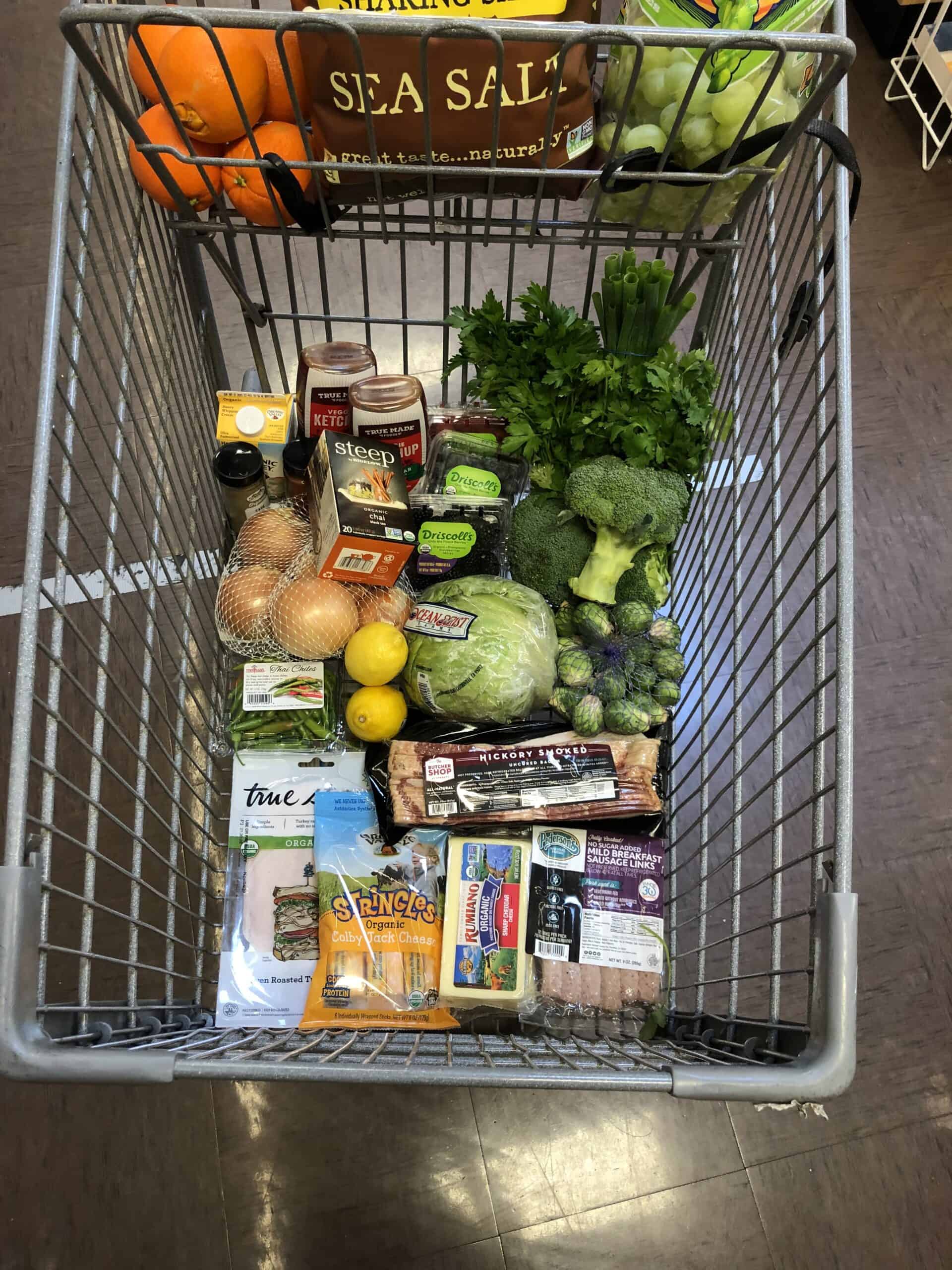 keto grocery haul at sprouts in a grocery cart