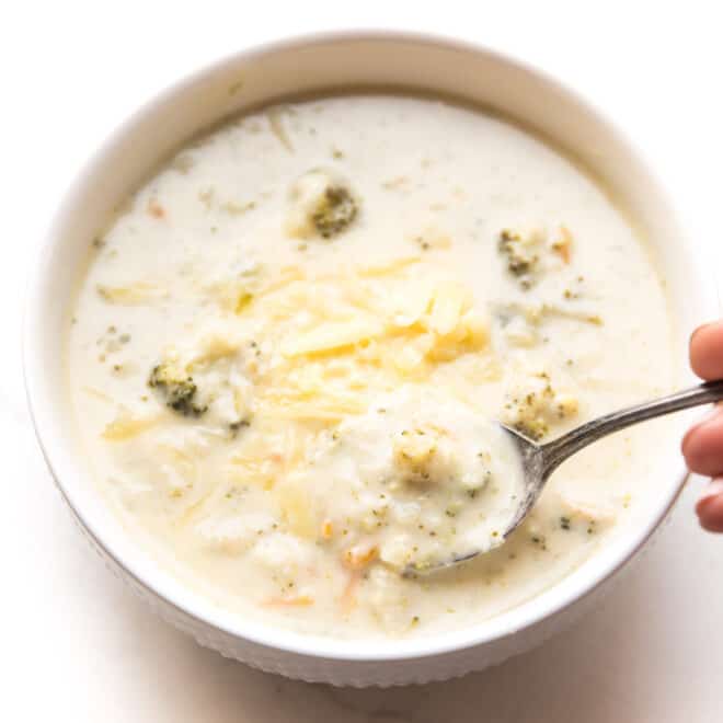 instant pot keto broccoli cheddar soup in a white bowl