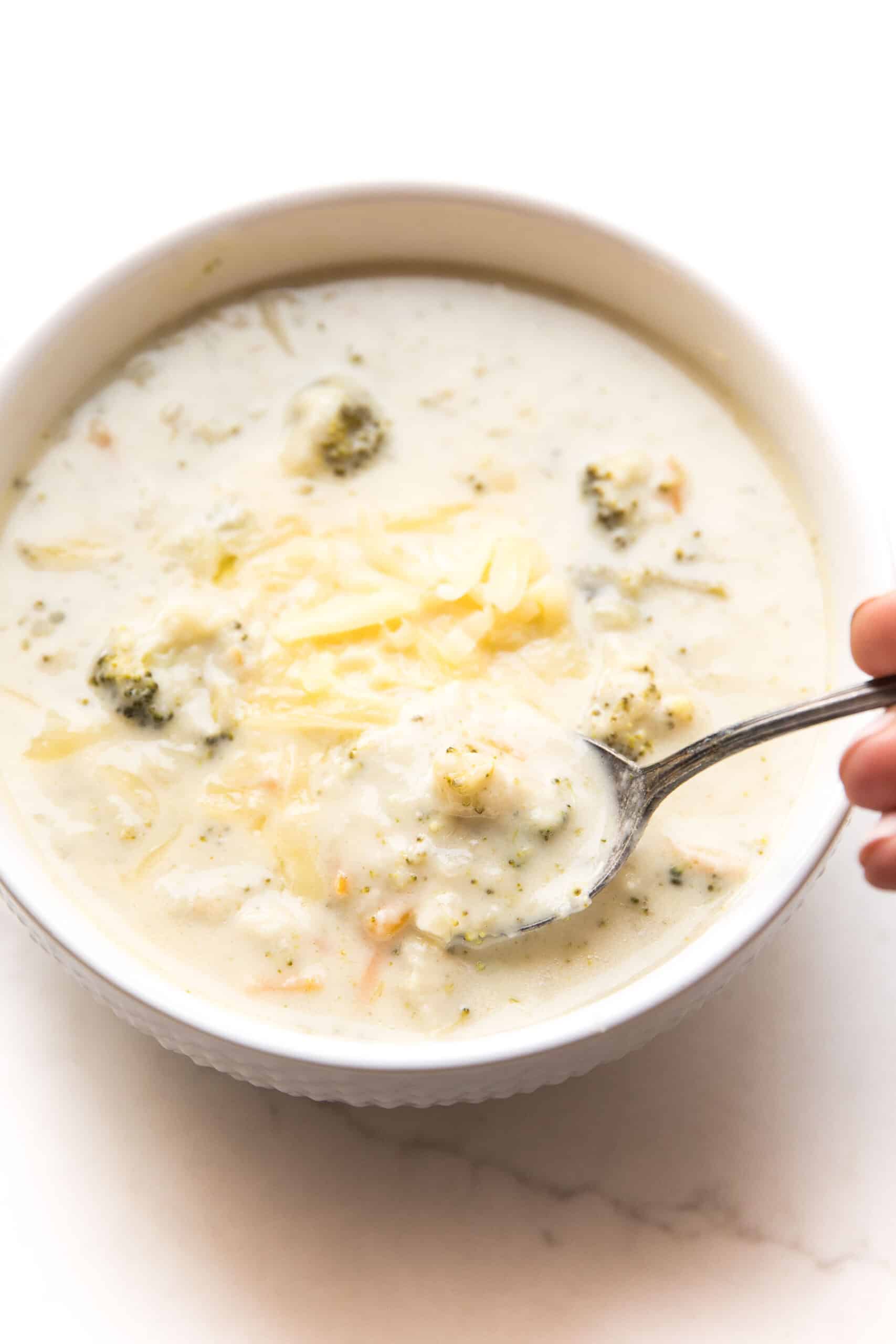 instant pot broccoli cheddar soup in a white bowl