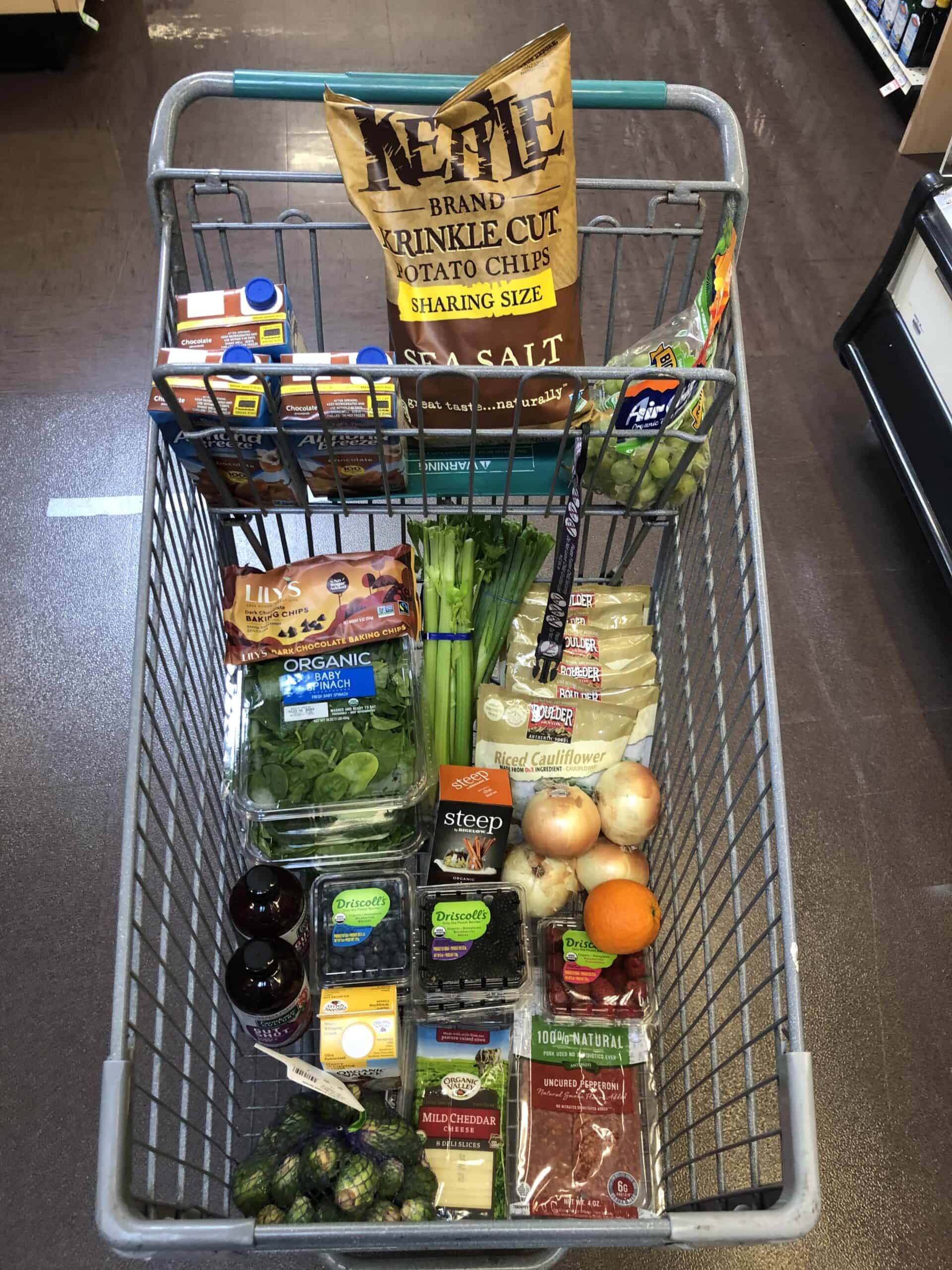 keto grocery haul from sprouts in a grocery cart