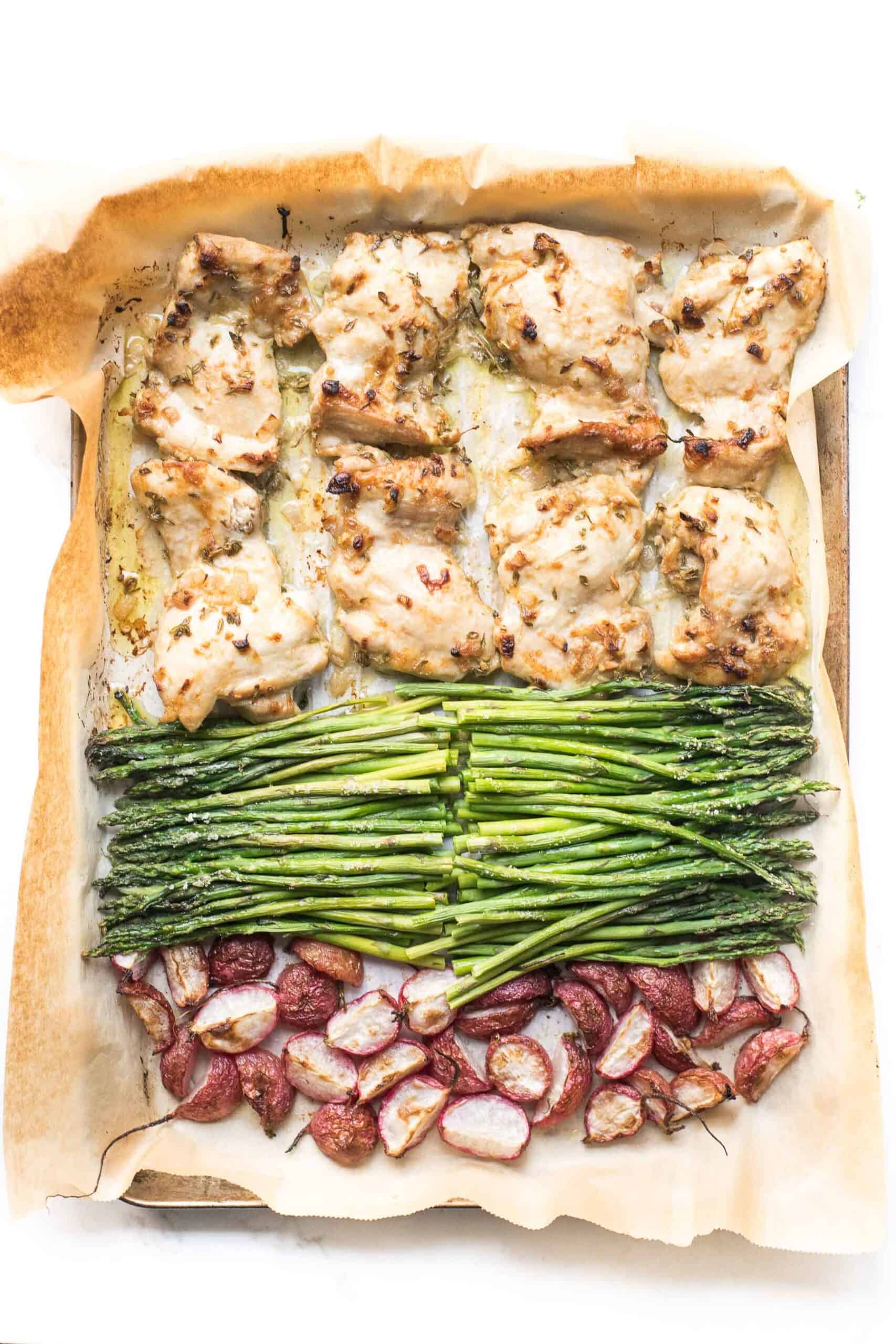 sheet pan dinner with dijon mustard chicken thighs, asparagus and radishes