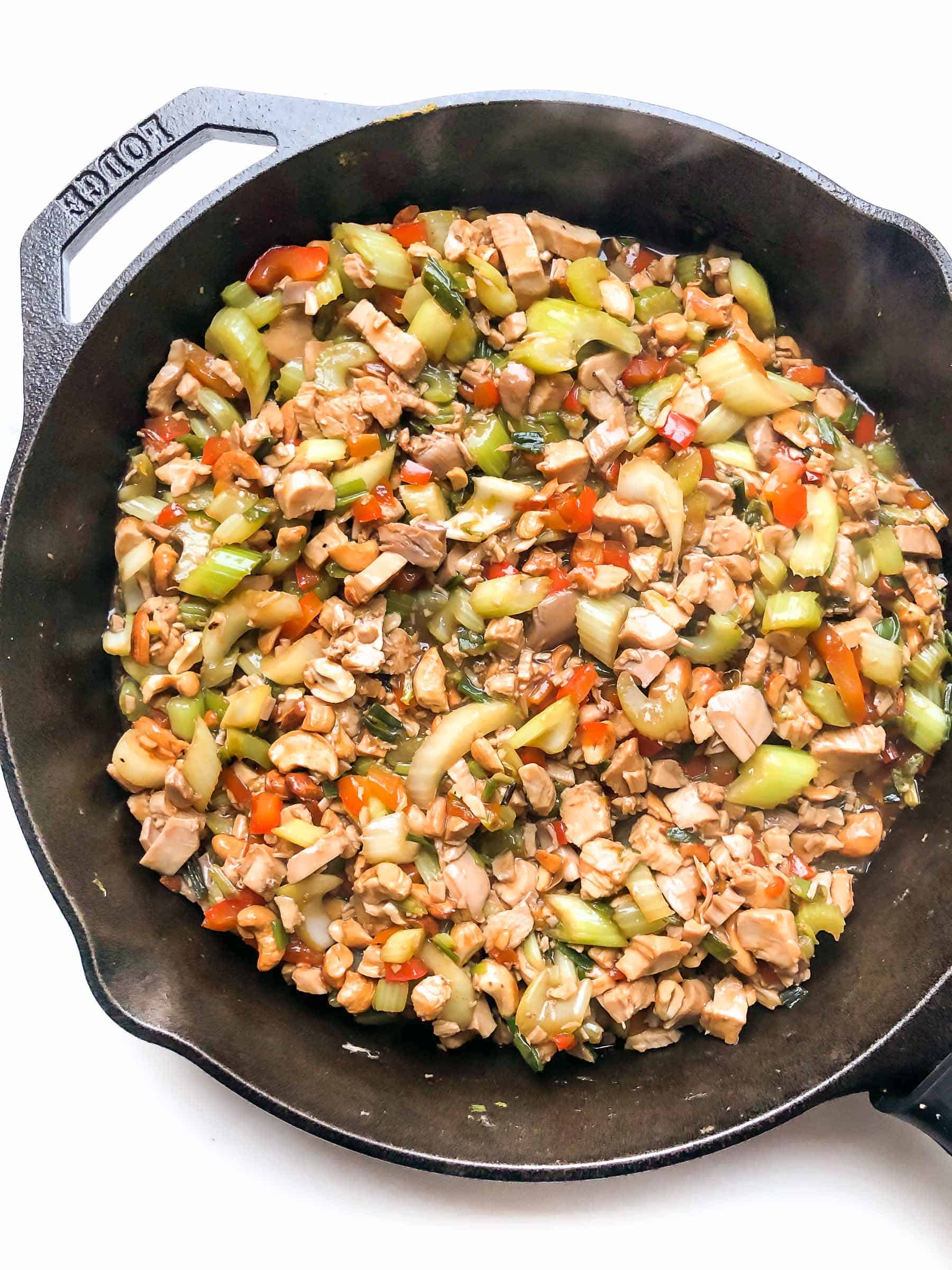 CHICKEN AND CELERY STIR FRY IN A CAST IRON SKILLET