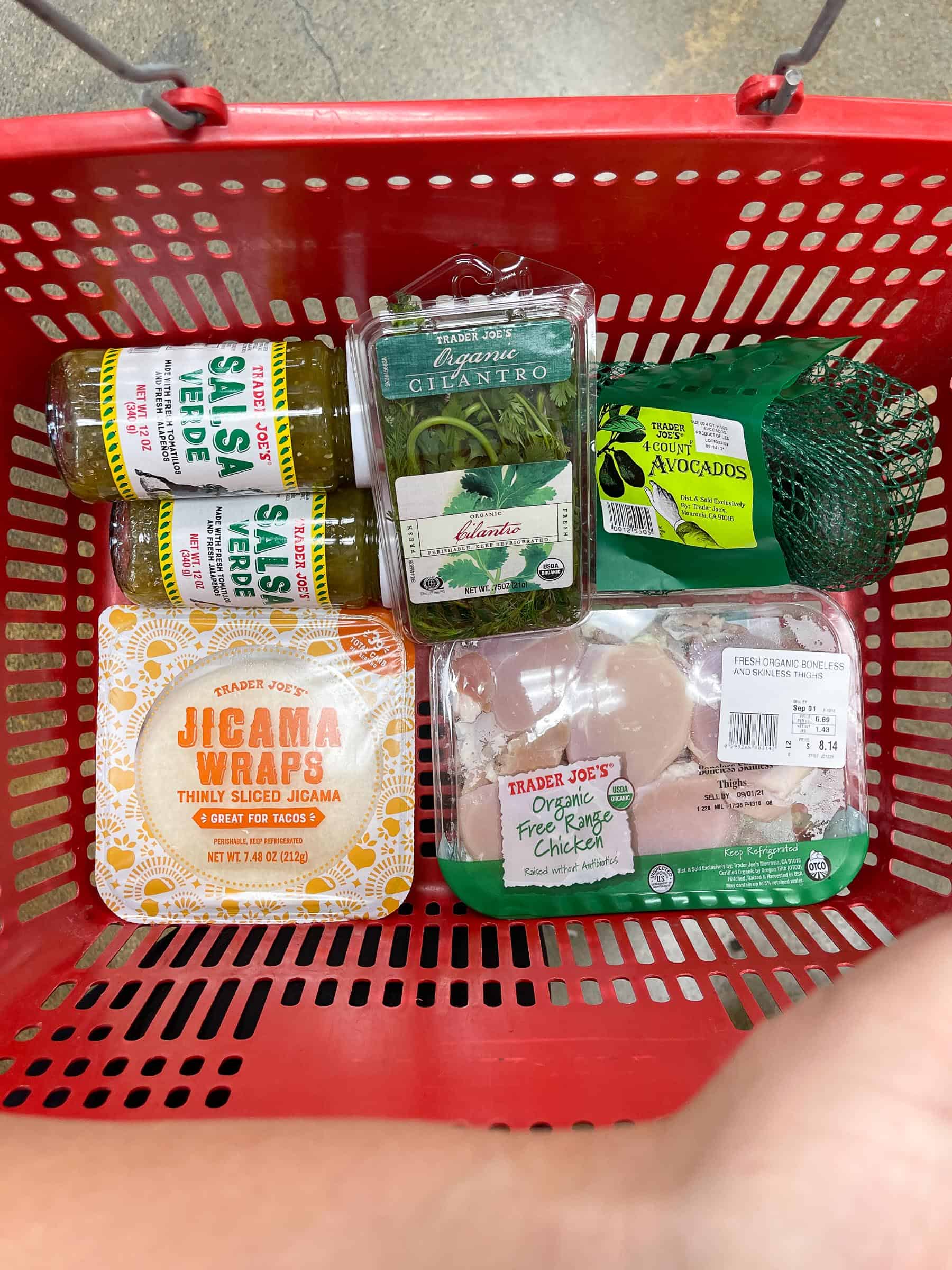 red trader joe's shopping basket with ingredients for keto crispy verde tacos