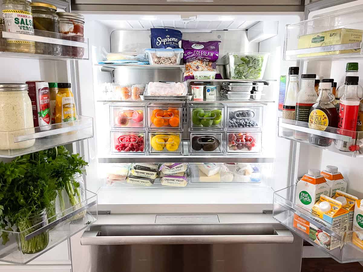 organized stainless steel refrigerator with drawers