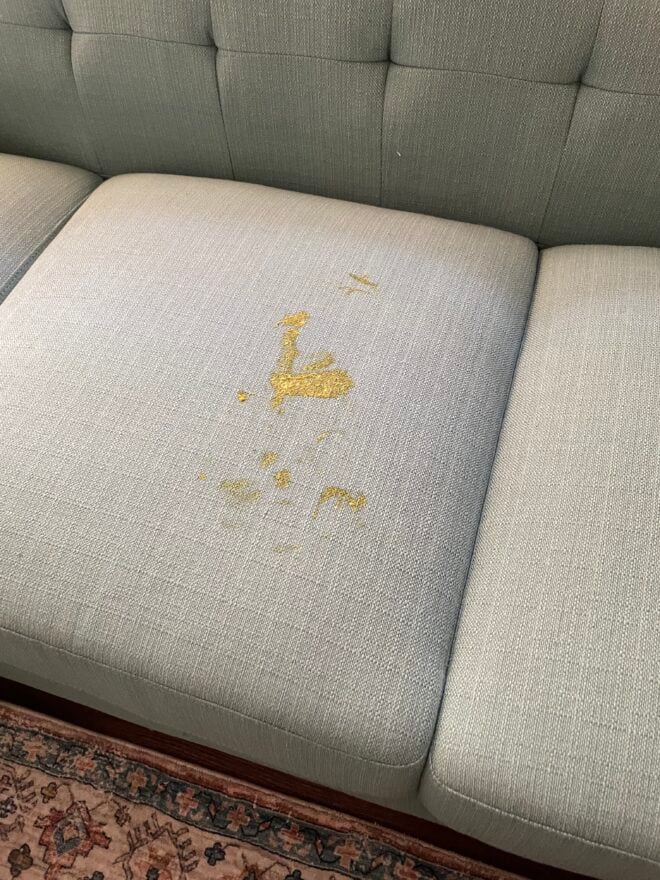 baby poop stain on the couch
