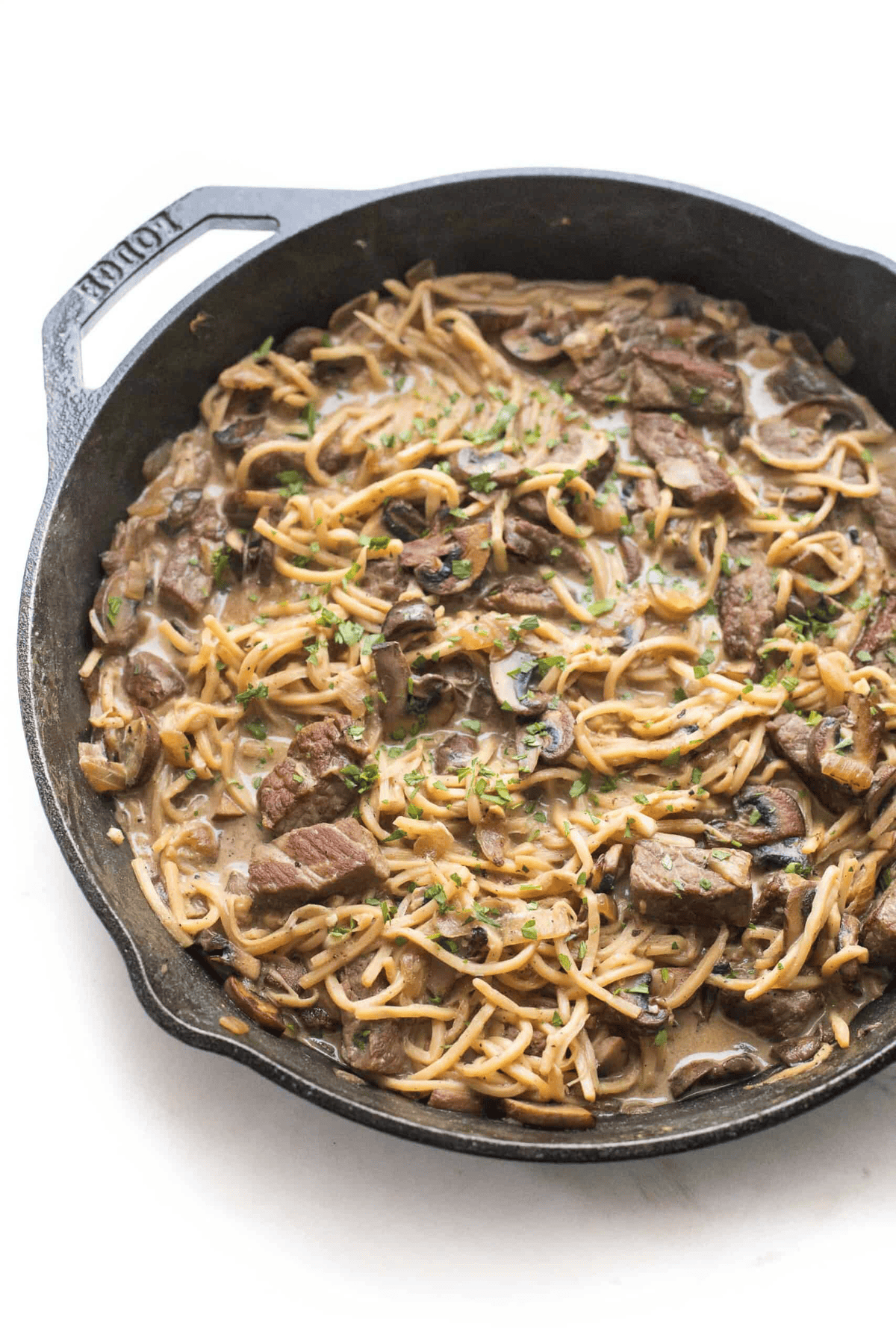 Photo of beef stroganoff in a cast iron skillet