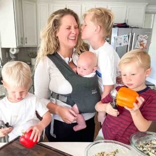 a mom and her four sons in the kitchen