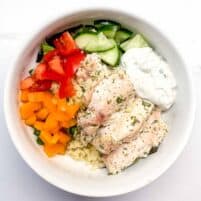 featured image of greek yogurt chicken in a bowl with veggies.