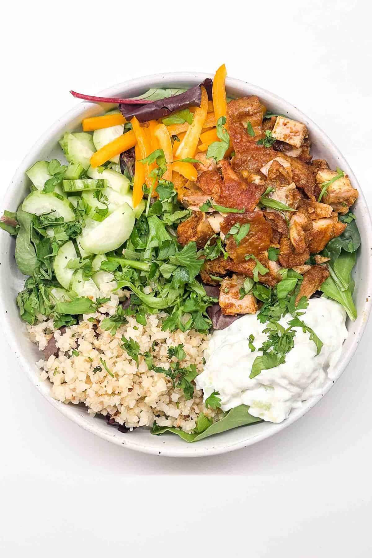 an overhead shot of chicken shawarma bowl 
