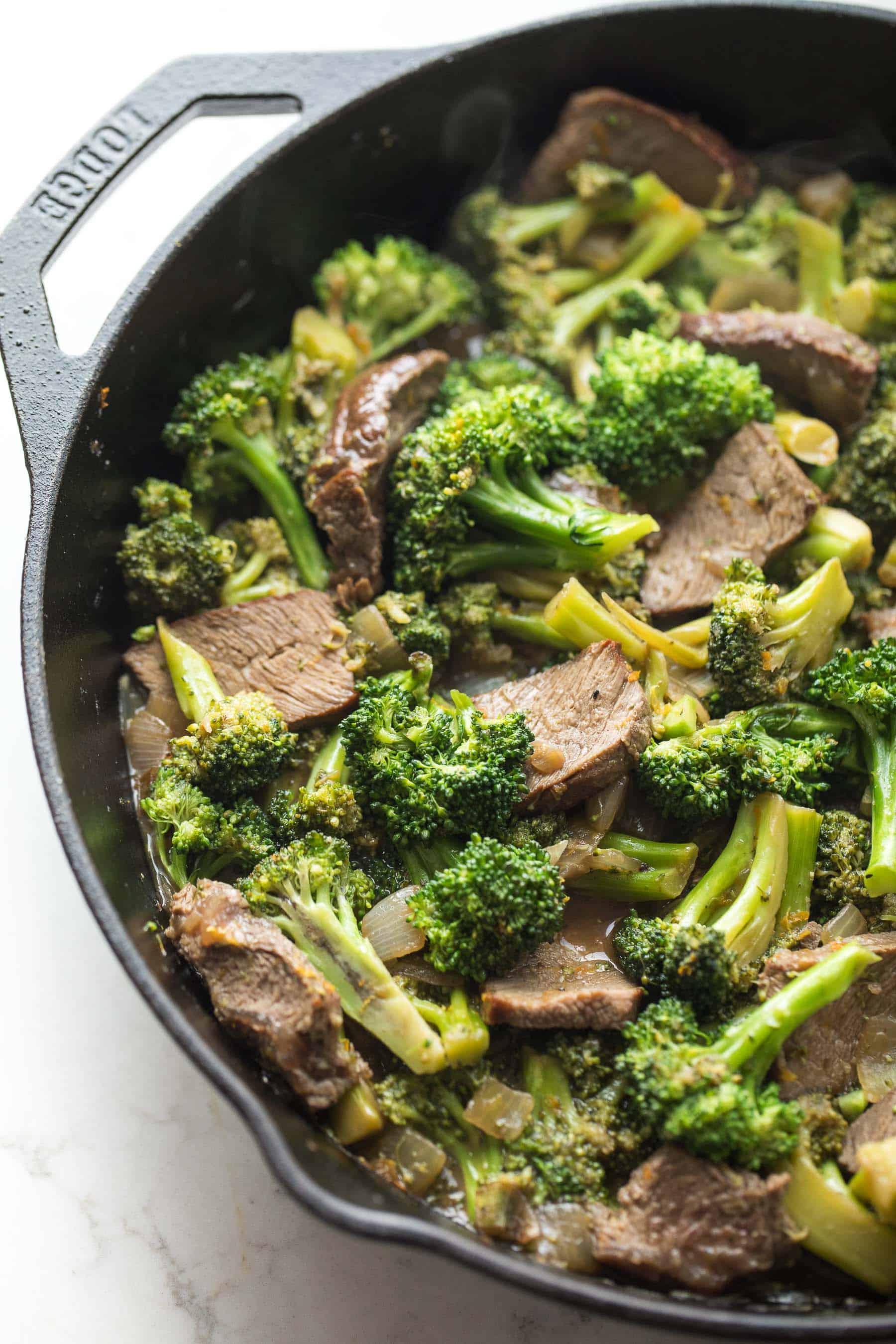broccoli beef in a cast iron skillet