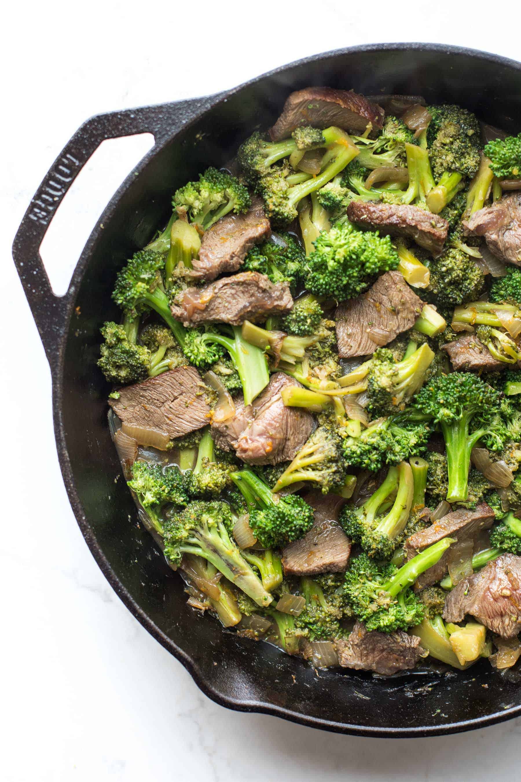 broccoli beef in a cast iron skillet