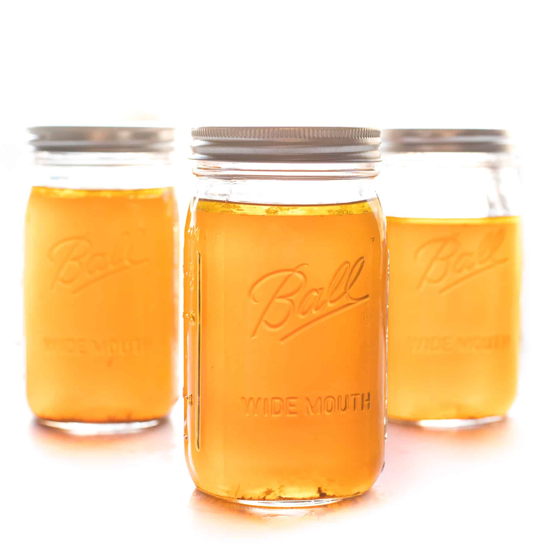 2 mason jars filled with bone broth